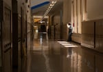 A student in the hallway at Jefferson High School on April 10, 2026. Jefferson is the seventh high school in line to receive renovations as part of the district's years-long plan to renovate its schools. 