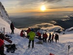 Search and rescue teams worked for nearly 23 hours straight to rescue to stranded climbers on Mount Hood.