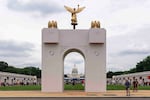 A mockup of President Donald Trump's proposed triumphal arch stands at the Great American State Fair on the National Mall, June 27, 2026, in Washington.