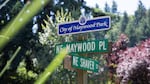 The city of Maywood Park, Ore., is made up of roughly 16 blocks of residential homes and lies entirely inside the city limits of Portland. A sign letting commuters know they're in Maywood Park is visible atop a street sign on Saturday, July 20, 2019.