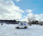 A USPS truck in the snow