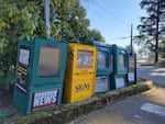 A newspaper box for Hoodview News sits alongside other newspapers on a street corner in rural Clackamas County on Jan. 24, 2025.