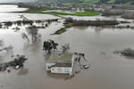 A home submerged in floodwater as the Salinas River overflowed its banks on Friday.