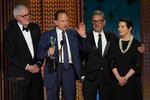 John Lithgow, from left, Ralph Fiennes, Sergio Castellitto, and Isabella Rossellini accept the award Sunday for outstanding performance by a cast in a motion picture for "Conclave" during the 31st annual Screen Actors Guild Awards at the Shrine Auditorium in Los Angeles. (AP Photo/Chris Pizzello)