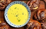 Soft pretzel rolls with warm beer-cheese dip (the dip is warm, not the beer)