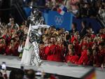 TOPSHOT - The horsewoman walks with the Olympic flag past athletes at the Trocadero during the opening ceremony of the Paris 2024 Olympic Games in Paris on July 26, 2024. (Photo by Oli SCARFF / AFP) (Photo by OLI SCARFF/AFP via Getty Images)