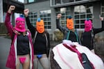 Women dressed in the spirit of famed Russian protest band Pussy Riot stand in unity during the Women's March on Portland, Saturday, Jan. 21, 2017.