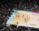 FILE - A Las Vegas Aces player drives the ball through the paint for a layup at the Moda Center in Portland, Ore., on July 9, 2026. The Portland Fire played the Las Vegas Aces, losing 88-80.