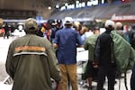 Military veterans are given food, clothing and other supplies during a Stand Down event designed to help veterans who are homeless or housing insecure on June 16, 2023 in Chicago.