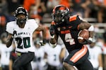 Oregon State running back B.J. Baylor (4) scores a touchdown off of a 30-yard rush during the second half of an NCAA college football game against Hawaii, Saturday, Sept. 11, 2021, in Corvallis, Ore. Oregon State won 45-27.