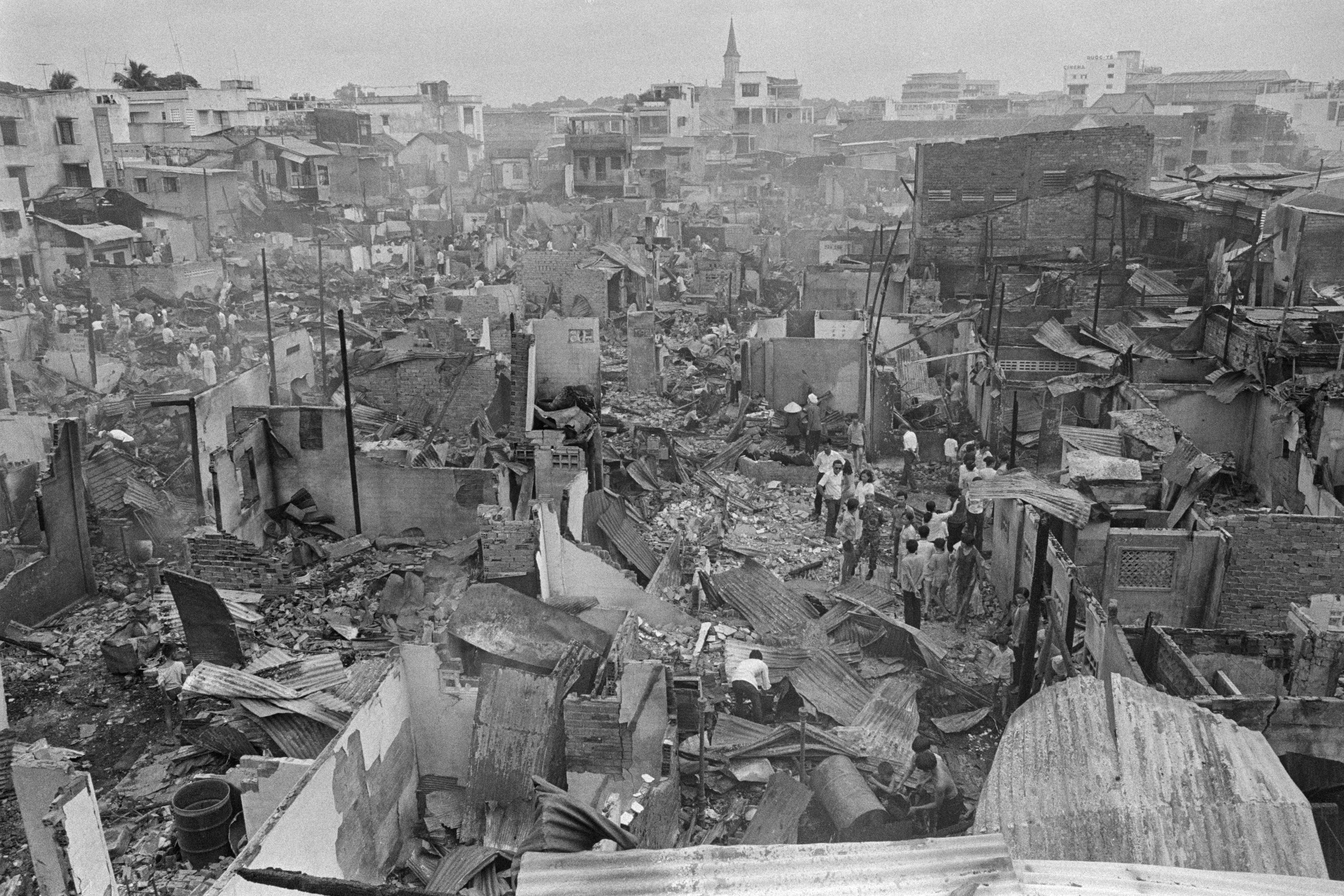 The first rocket attack hitting Saigon struck the town center and set fire to 150 wooden houses. Fourteen died and over 40 people were injured in the attacks. Inhabitants of Saigon woke up to the devastation of war on April 21, 1975.