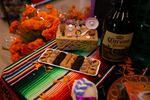 Sweets and a caguama of beer are on Yamley Chavez Kennedy's ofrenda at Colima Market in Bend, Ore. on Oct. 30, 2024. Her aunt loved beer, she said.