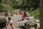 The Ghostbusters' machine sprayed the crowd with water as they flew down Mt. Tabor.