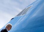 President Biden boards Air Force One in Madrid after the NATO summit for the flight back to Washington.