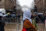 Demonstrators protest the arrest and detention of pro-Palestinian activist Mahmoud Khalil outside of Columbia University. Khalil, a graduate student with a green card, is a legal permanent resident.