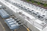 FILE - A cooling system are on the roof of a data center, April 27, 2026, in Hillsboro, Ore. Tax breaks for new data center development are behind a lawsuit filed by 1000 Friends of Oregon this week.