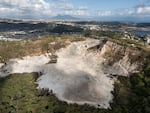 The crater of the Solfatara with Mount Vesuvius in the background. The Solfatara of Pozzuoli and Mount Vesuvius are both part of the Campanian volcanic system, although they belong to different types of volcanic structures. Solfatara is part of the Campi Flegrei caldera, known for ground uplift, seismic activity, and degassing, while Vesuvius is a classic cone volcano, famous for its catastrophic eruption that destroyed Pompeii.