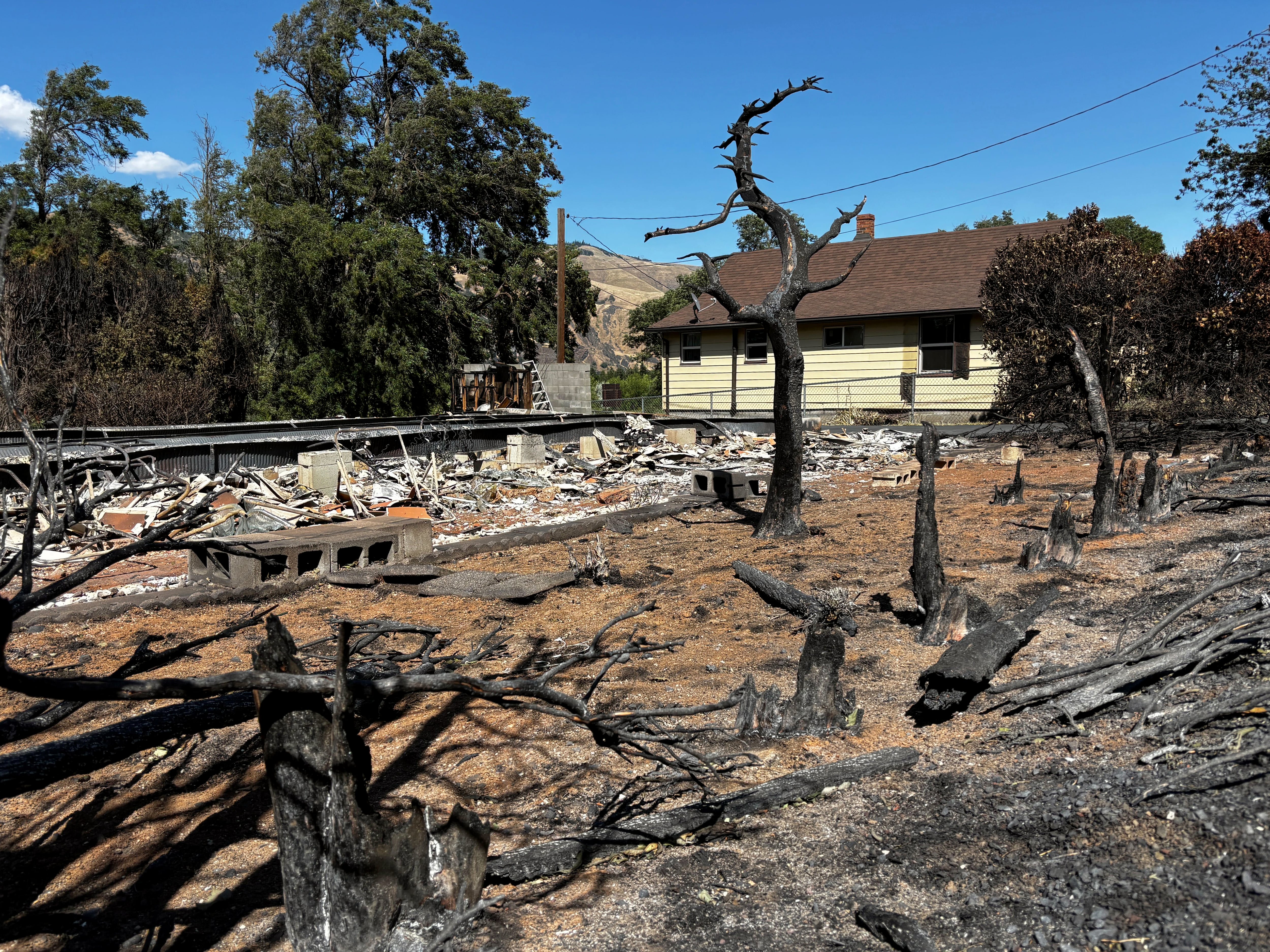 Lawmakers hoped to take action to fund wildfire costs, like that of the Rowena Fire. They failed to pass a major funding package, but did find some permanent money through a new tax.