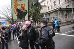 A Portland police officer wearing a "pussyhat" — what has become a symbol of the Women's March — hugs a demonstrator during the Women's March on Portland on Saturday, Jan. 21, 2017.