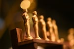 Oscar statues in a press preview in February 2025.