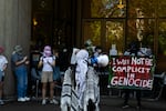 In this photo contributed by Oregon State University student Mya Kraus, students gather outside an administration building to protest the war in Gaza. Student protesters chained themselves in a 100-hour protest, starting Thursday, June 6, 2024.
