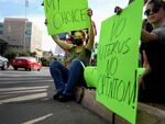 Abortion rights advocates rally at the Tucson Federal Courthouse in 2022. The state Supreme Court is deciding whether a 15-week ban or a near-total ban which dates back to the Civil War should be the state's enforceable abortion law.