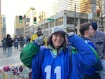 Seattle Seahawks fan Serenna Duncan took a day off from work to attend the Super Bowl LX celebration in downtown Seattle on Wednesday, Feb. 11, 2026.