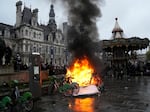 Bicycles burn during a protest outside the Paris City Hall on Friday, the day France's Constitutional Council approved an unpopular plan to raise the retirement age from 62 to 64.