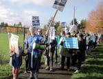 Teacher Katia Fleischman and her daughter Vera march in support of the Portland Public School strike on Nov. 7, 2023.