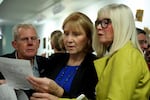 Vancouver Mayor-elect Anne McEnerny-Ogle, center, and City Council candidate Linda Glover review election results on Tuesday, November 7, 2017.