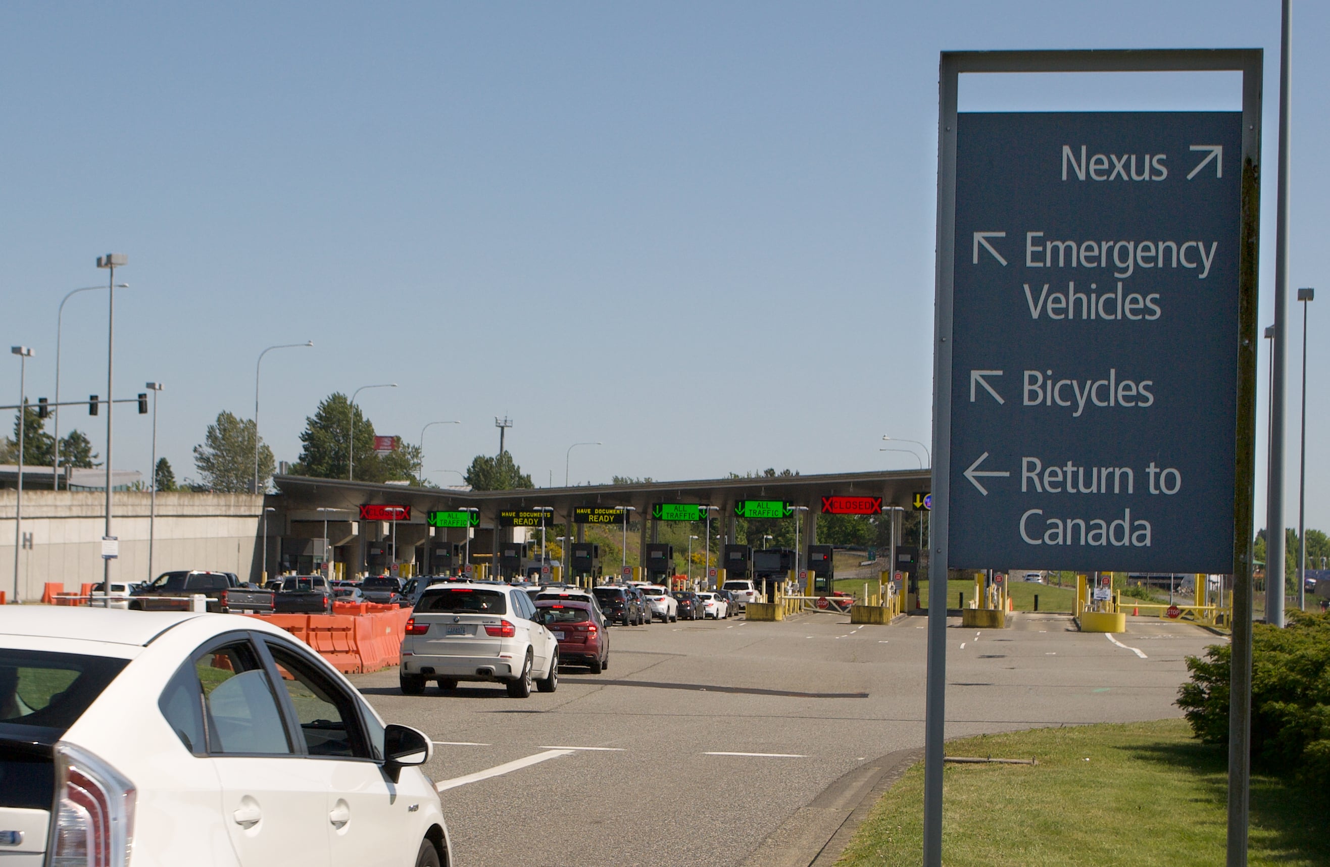 A car drives towards the Peace Arch border crossing on May 24, 2025 in Blaine, Washington. In late April, a family of six was detained near the border and spent more than three weeks in custody.