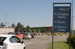A car drives towards the Peace Arch border crossing on May 24, 2025 in Blaine, Washington. In late April, a family of six was detained near the border and spent more than three weeks in custody.