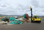 In this supplied photos, old commercial fishing nets from Newport, Ore., are loaded into a container in April, 22, 2026. The nets are sent to Ukraine, used as impromptu drone protection.