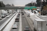 Drivers navigate an icy Interstate 5 the day have a strong storm dumped between 1 to 3 inches in the Portland area, Dec. 15, 2016