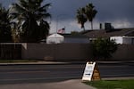 A "vote here" sign is seen on presidential preference election day in Maricopa County, Mesa, AZ. at a Church of Jesus Christ of Latter Day Saints.