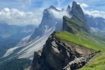 Clouds hang over the 'Seceda' Dolomites mountain in the northern Italian province of South Tyrol, which i