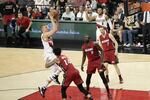 Mason Plumlee shoots over Miami defenders in the Portland Trail Blazers' 110-93 win over the Heat on April 2, 2016.