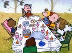 The scene from A Charlie Brown Thanksgiving that left may people wondering why Franklin is sitting alone.