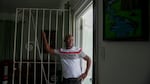 Juan Vega Paredes, a Dominican man who was arrested by immigration authorities in Puerto Rico in January, poses for a portrait in his home in San Juan, Puerto Rico on June 3, 2025.