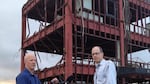 Oregon Field Guide producer Ed Jahn, right, with Oregon Public Broadcasting videographer Todd Sonflieth in front of the destroyed disaster prevention building in Minamisanriku, Japan, 2014. The building was destroyed during the March 11, 2011 earthquake and tsunami in that region.