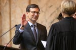 Bob Ferguson is sworn in as the 24th Governor of the State of Washington during his inauguration ceremony Wednesday, Jan. 15, 2025, at the Washington State Capitol in Olympia, Wash.