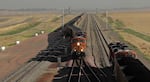 File photo of coal trains traveling from a mine in Wyoming.