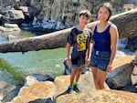 Miracle Edmiston, 14, and her brother, Eagle, 12, searched Willamette Falls for lamprey. Students from the Confederated Tribes of the Umatilla Indian Reservation hoped to gather lamprey before the celebration officially began.
