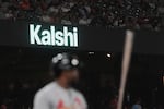 A Kalshi sign is displayed at Oracle Park during a baseball game between the San Francisco Giants and the St. Louis Cardinals, Tuesday, Sept. 8, 2026, in San Francisco.