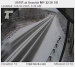 In this image captured by an Oregon Dept. of Transportation camera just after 8:30 a.m. on Feb. 4, U.S. 101 at Seaside along the Oregon Coast is mostly covered with snow. Its elevation is 13 feet.