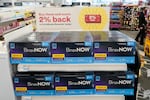 FILE - Boxes of BinaxNow home COVID-19 tests made by Abbott are shown for sale on Nov. 15, 2021, at a CVS store in Lakewood, Wash.