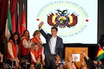 Presidential candidate Rodrigo Paz waves to supporters after preliminary results showed him leading in the presidential runoff election in La Paz, Bolivia on Sunday.