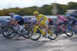 Slovenia's Tadej Pogacar, wearing the overall leader's yellow jersey, rides during the last stage of the Tour de France cycling race with start and finish in Paris, Sunday, July 26, 2026.