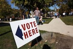 Residents vote in early voting at a park building in Detroit on Oct. 19. Detroit is the first Michigan community to have early voting. Both Vice President Harris and former President Donald Trump have been campaigning in the key battleground state of Michigan. 