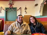 Sergio Madrigal and his wife, Rosa, sit at El Valle Family Mexican Restaurant in Sunnyside, Wash. The Madrigals lost their farm after a mad cow scare in the early 2000s and the Great Recession.